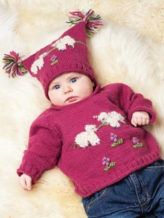 Stickad tröja och mössa med får