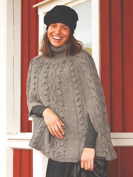 Mönsterstickad poncho