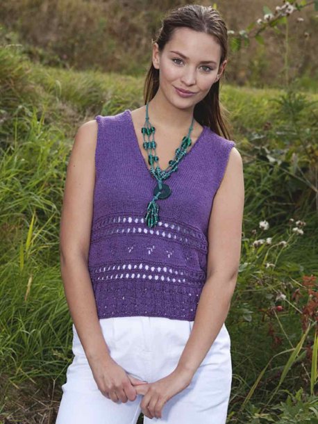 Kofta och linne med spetsstickad bård