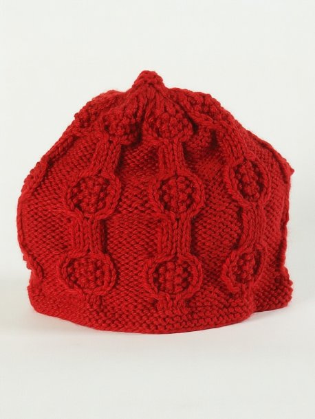 Stickad mössa, halsduk, väska och tehuva